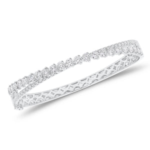 Diamond overlap bangle bracelet - 14K gold weighing 16.37 grams
- 62 round diamonds weighing 3.78 carats