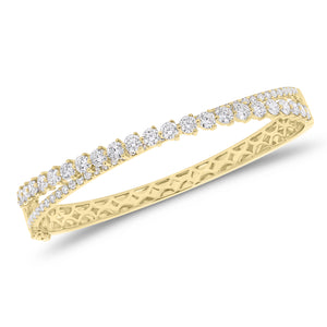 Diamond overlap bangle bracelet - 14K gold weighing 16.37 grams
- 62 round diamonds weighing 3.78 carats