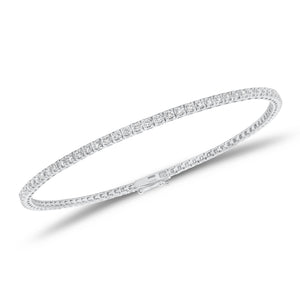 1.01 ct diamond tennis bracelet - 18K gold weighing 7.38 grams
- 86 round diamonds weighing 1.01 carats