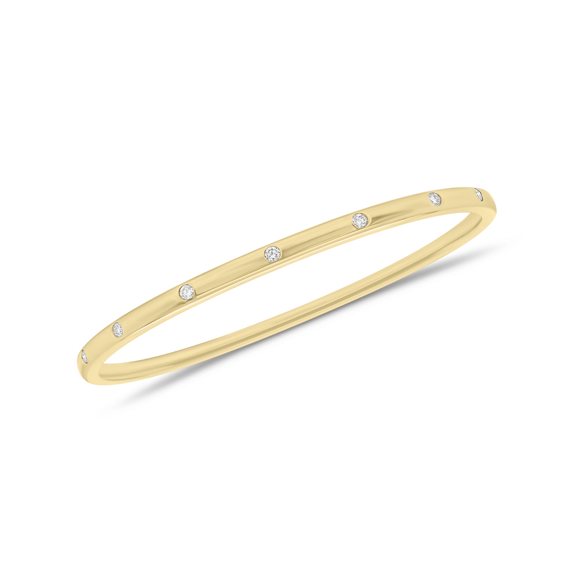 Diamond Dotted Bangle Bracelet - 18K gold weighing 11.74 grams  - 7 round diamonds weighing 0.21 carats