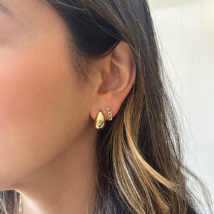 Female model wearing Gold raindrop earrings - 14K gold weighing 3.49 grams