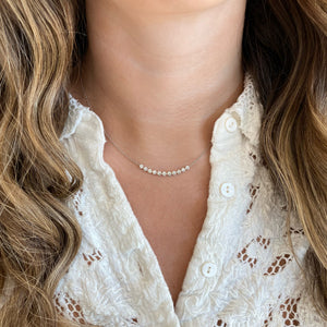 Female Model Wearing 1.06 ct Diamond Bar Necklace - 18K gold weighing 3.12 grams - 11 round diamonds weighing 1.06 carats