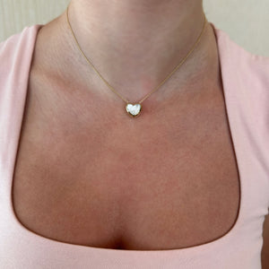 Female Model Wearing Mother of Pearl Heart Bezel Pendant Necklace - 14K gold weighing 3.60 grams - 1 Mother of Pearl