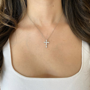 Female Model Wearing Marquise & Round Diamond Cross Pendant - 18K gold weighing 1.64 grams - 14K gold weighing 1.60 grams - 5 marquise-shaped diamonds weighing 0.44 carats - 30 round diamonds weighing 0.24 carats