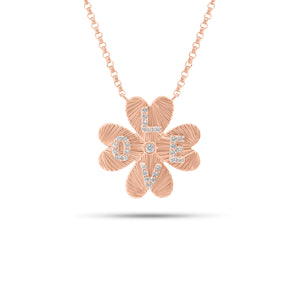 Diamond & Fluted Gold Four Leaf Clover “Love” Pendant Necklace - 14K gold weighing 3.90 grams - 30 round diamonds weighing 0.20 carats