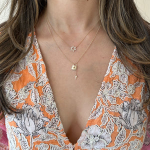 Female Model Wearing Diamond Star of David Necklace - 14K gold - 0.11 cts round diamonds