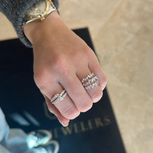 Female Model Wearing Pear-Shaped Diamond Multi Wrap Ring - 18K gold weighing 3.18 grams - 2 pear-shaped diamonds weighing 0.35 carats  - 19 round diamonds weighing 0.87 carats