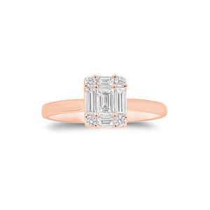 Emerald-Cut Diamond Illusion Engagement Ring - 18K gold weighing 2.66 grams  - 0.19 ct emerald-cut diamond  - 4 round diamonds weighing 0.07 carats  - 4 straight baguettes weighing 0.27 carats