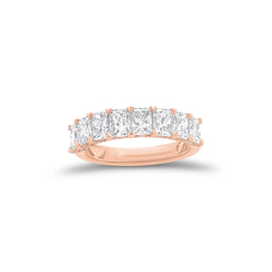 Radiant-Cut Diamond Wedding Band - 18K gold weighing 3.47 grams - 66 round diamonds weighing 0.24 carats - 8 radiant-cut diamonds weighing 2.35 carats