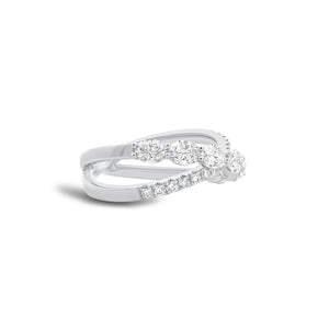 Oval & Round Diamond Crossover Ring - 18K gold weighing 4.40 grams - 7 oval-shaped diamonds weighing 1.16 carats - 14 round diamonds weighing 0.20 carats