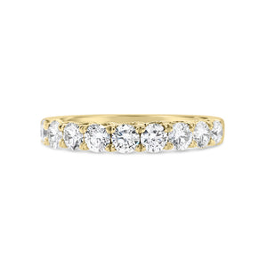 9 stone diamond wedding band -18k gold weighing 3.07 grams   -9 round diamonds weighing .77 carats 