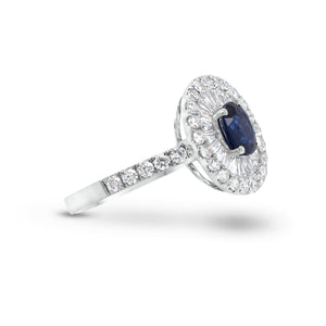 Sapphire double halo ring  - 18K gold weighing 3.88 grams  - 32 round diamonds totaling 0.55 carats  - 21 tapered baguettes totaling 0.51 carats  - 0.82 ct sapphire