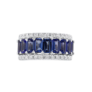 Tanzanite & diamond band - 18K gold weighing 6.06 grams  - 9 tanzanites totaling 2.55 carats  - 26 round diamonds totaling 0.52 carats